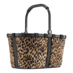 Lieblingstasche Carrybag XS featuring a leopard print faux fur exterior with black trim and a sturdy carry handle.