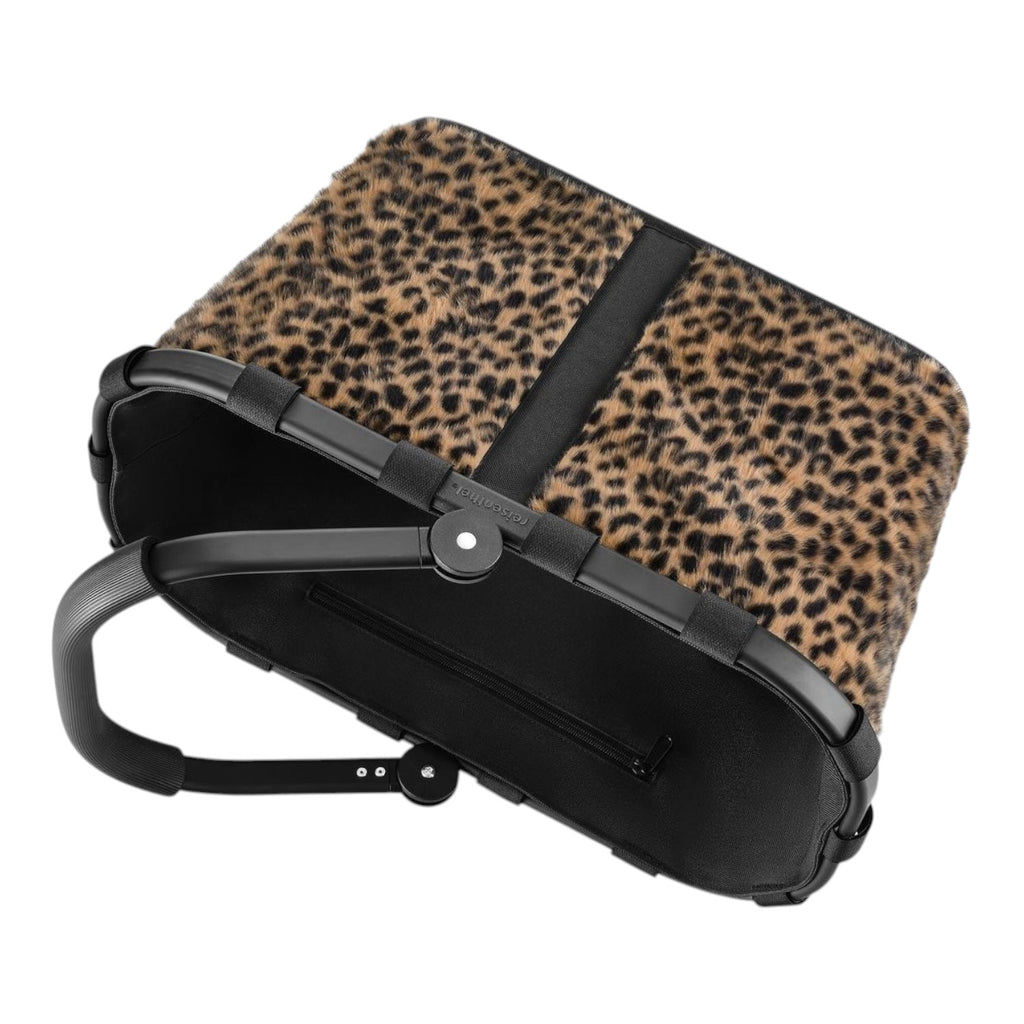 Lieblingstasche Carrybag shopping basket with a leopard print faux fur exterior and black aluminium handle