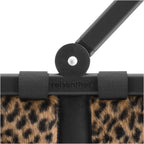 Lieblingstasche Carrybag shopping basket with a leopard print faux fur pattern and a black aluminium handle.