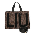 Lieblingstasche Tote Animalier L featuring a brown leopard print faux fur finish with large black logo lettering.