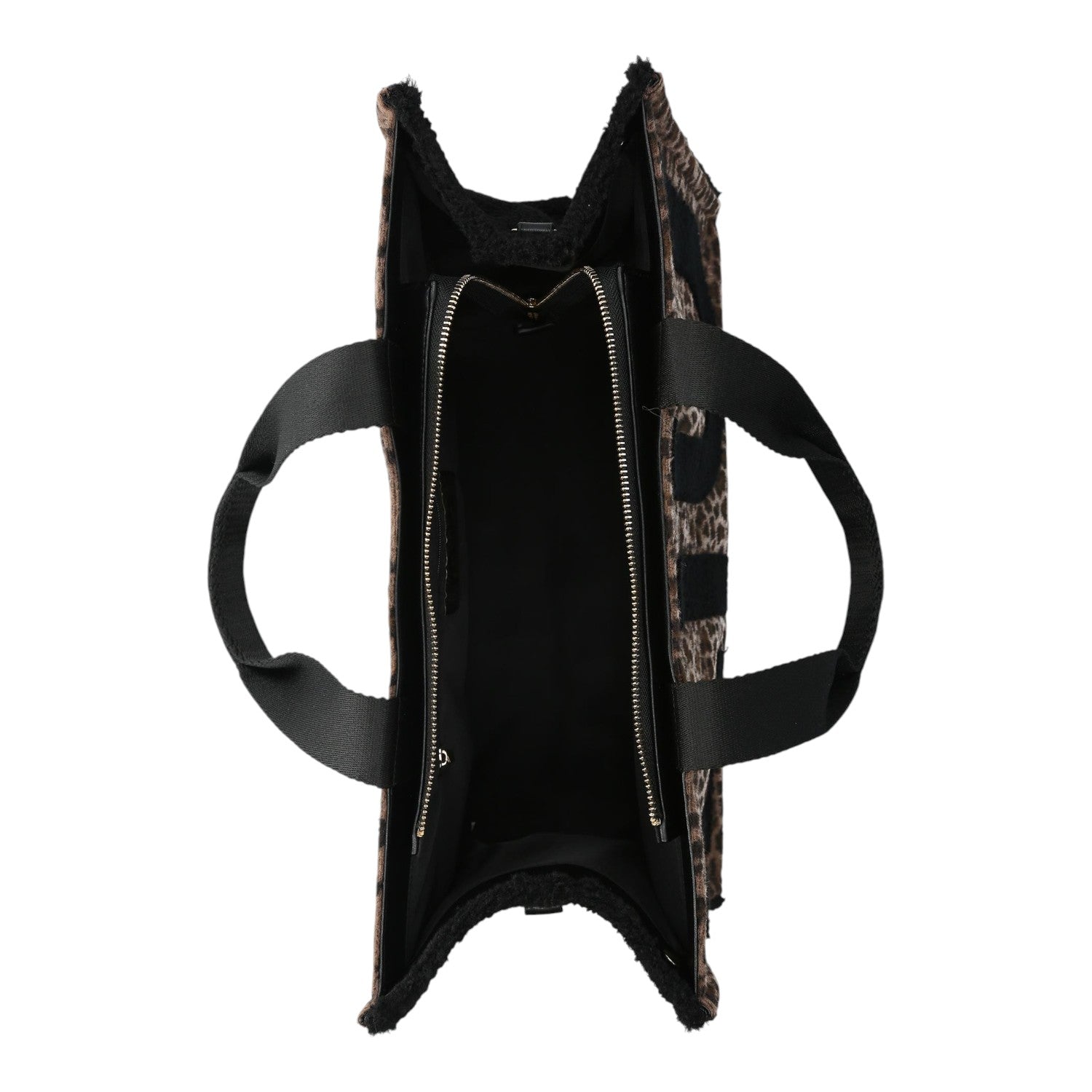 Lieblingstasche Tote Animalier L featuring a leopard print faux fur exterior and black fabric handles, top view.