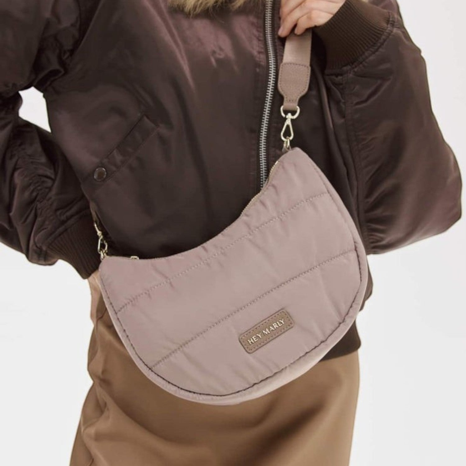 Lieblingstasche Lifetime Buddy S quilted crescent crossbody bag in taupe with adjustable strap