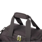 Lieblingstasche Lightstyler Duffle L in black with durable fabric, sturdy top handles, and bright lime zipper pulls.