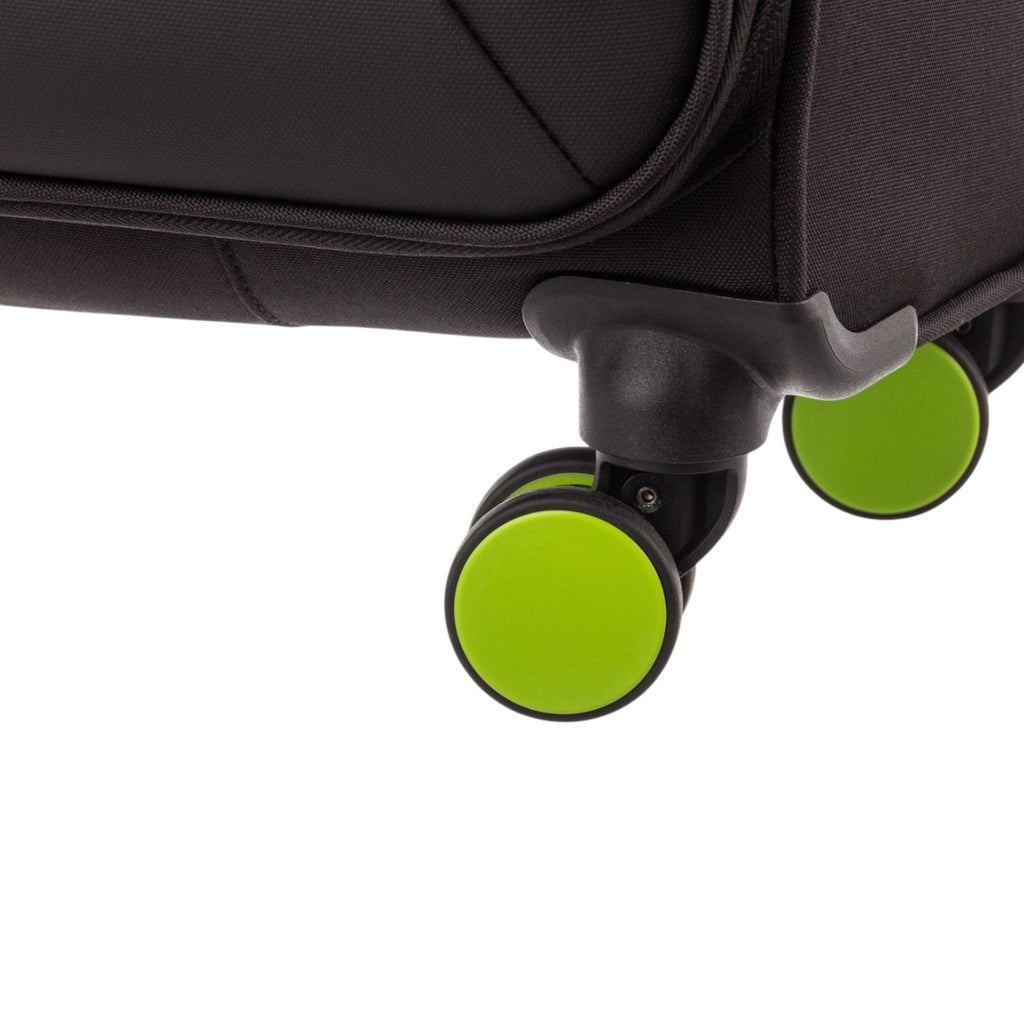 Lieblingstasche Lightstyler Spinner M suitcase featuring durable black fabric and bright green spinner wheels.