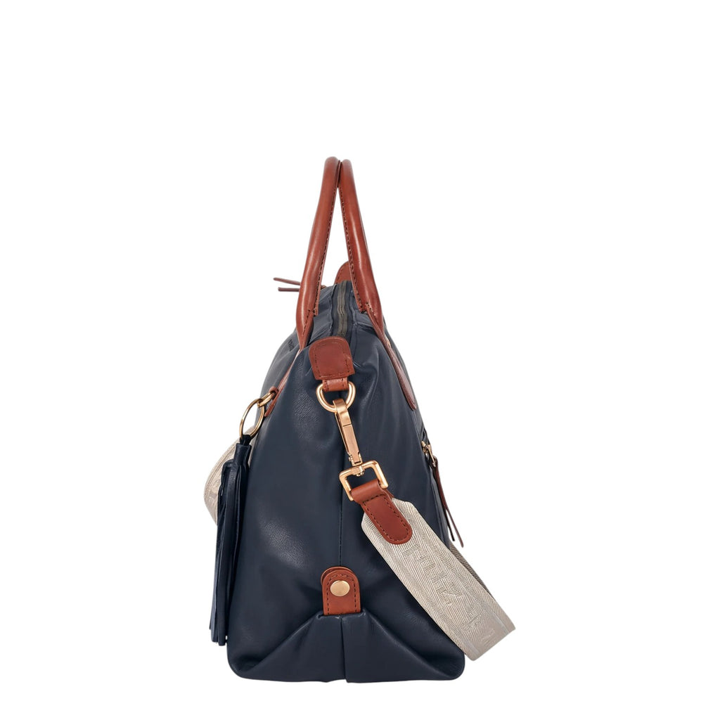 Lieblingstasche Lucia M navy blue leather handbag with brown trim and adjustable strap.
