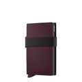 Lieblingstasche Bandwallet Matte in dark purple with a black elastic strap and integrated card protector mechanism