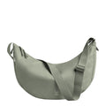Lieblingstasche Moon Bag Large, a soft sage green crossbody bag made from recycled materials with adjustable strap and zip closure.