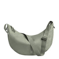Lieblingstasche Moon Bag Large, a soft sage green crossbody bag made from recycled materials with adjustable strap and zip closure.