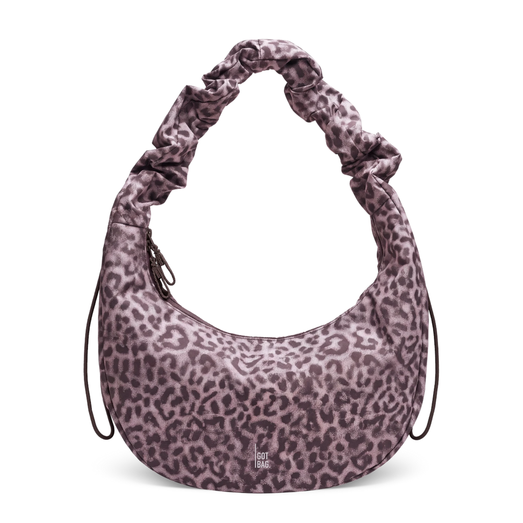 Lieblingstasche Moon Bag Ruffle in large size with a grey and purple leopard print pattern and gathered shoulder strap