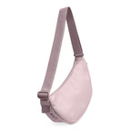Lieblingstasche Moon Bag Small in light pink with an adjustable crossbody strap, side view