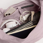 Lieblingstasche Moon Bag Ruffle Large in dusty purple, showing the spacious interior with organized accessories.