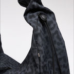 Lieblingstasche Moon Bag Ruffle in dark grey cat shark leopard print with a gathered strap and adjustable toggle