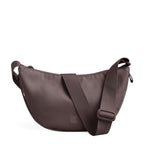 Lieblingstasche Moon Bag Small in a muted mauve tone with an adjustable crossbody strap and minimalist design