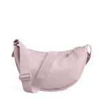 Lieblingstasche Moon Bag Small in light pink, a crescent-shaped crossbody bag with an adjustable shoulder strap.