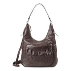 Lieblingstasche Mrs. Banoffee Pie dark brown leather hobo bag with a slouchy silhouette and front pocket detail.