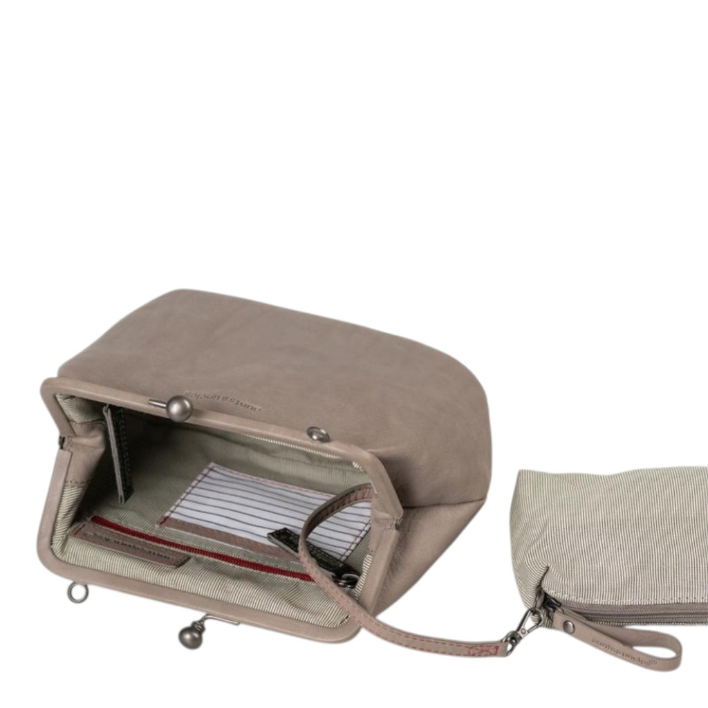 Lieblingstasche Mrs. Pizzelle taupe leather handbag with a kiss-lock clasp and an open interior featuring a striped lining.