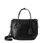 Lieblingstasche Mrs. Profiterole black leather handbag with dual top handles and a detachable shoulder strap.