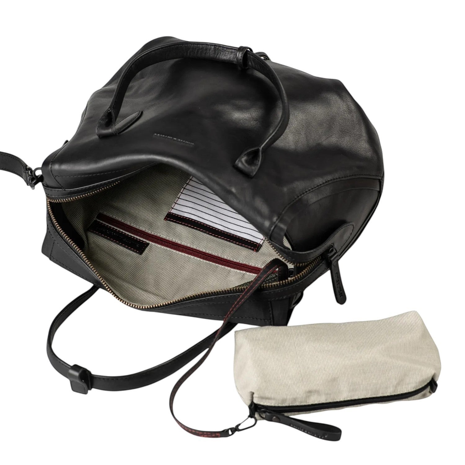 Lieblingstasche Mrs. Profiterole black leather handbag with open top, fabric lining, and matching small pouch
