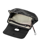 Lieblingstasche Mrs. Whoopie Pie black leather clutch bag with a kiss-lock closure and striped interior lining.