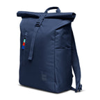 Lieblingstasche navy blue rolltop backpack with buckle closure and colorful zipper pull.