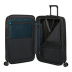 Lieblingstasche NEXIS Spinner 76/28 Exp black suitcase open with interior mesh pockets and compression straps