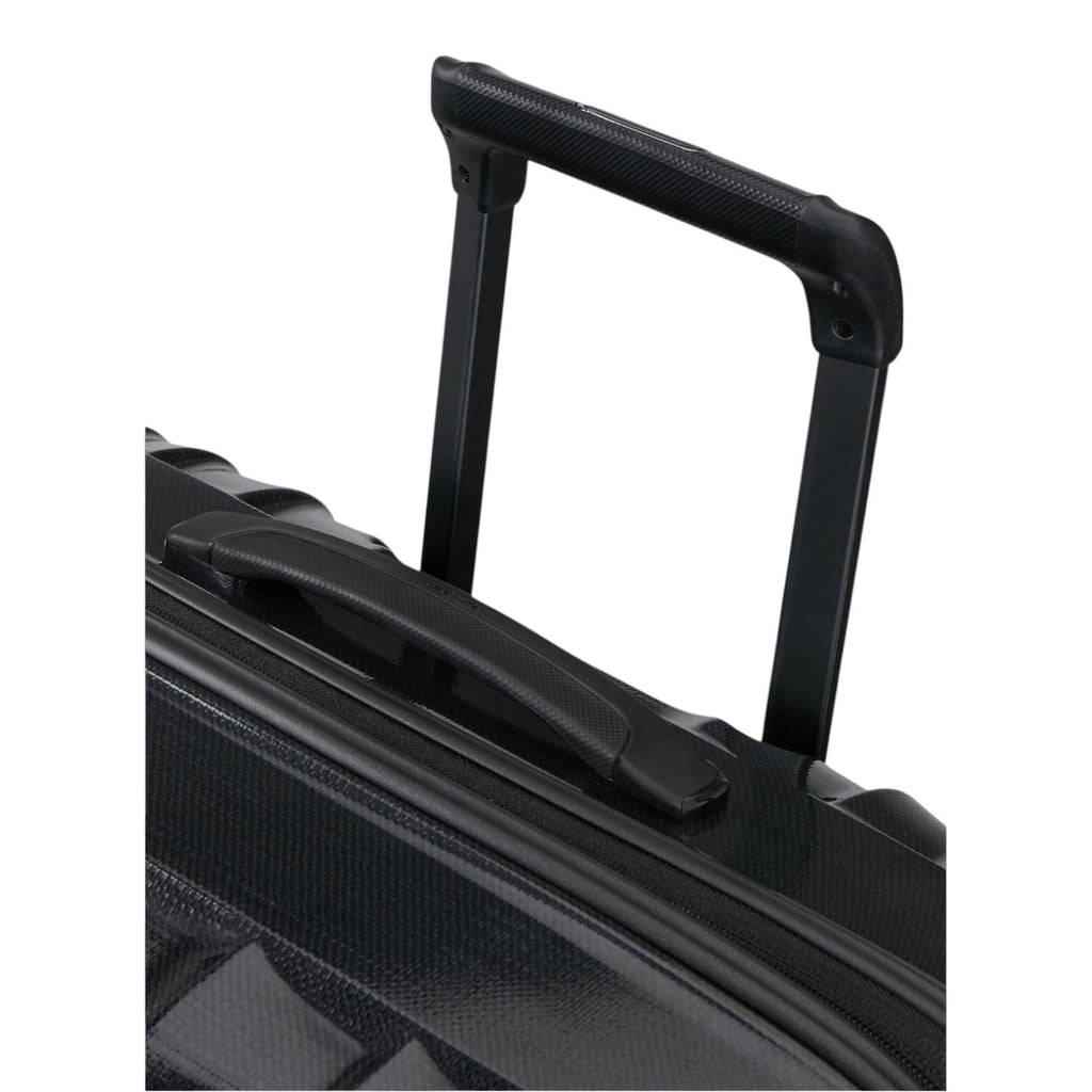 Lieblingstasche NEXIS Spinner 76/28 Exp black hardshell suitcase featuring a retractable handle and top carry grip