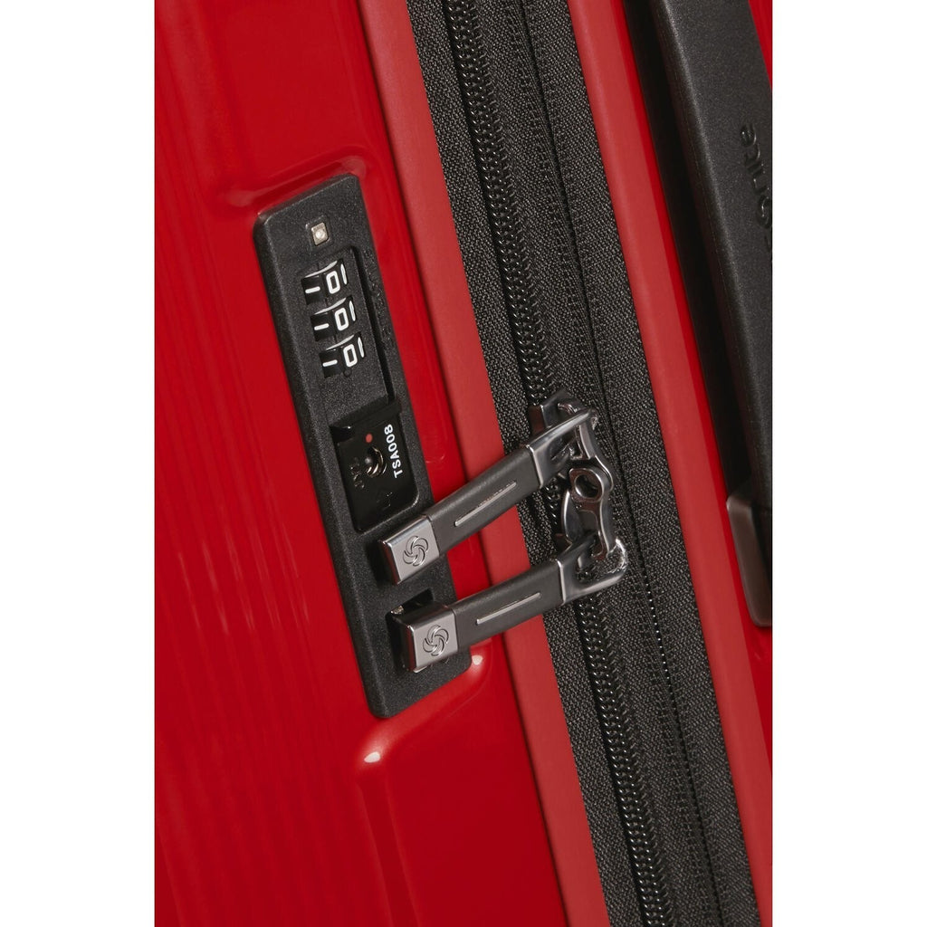 Lieblingstasche NUON Spinner 75/28 suitcase featuring a red hardshell exterior and integrated TSA combination lock.