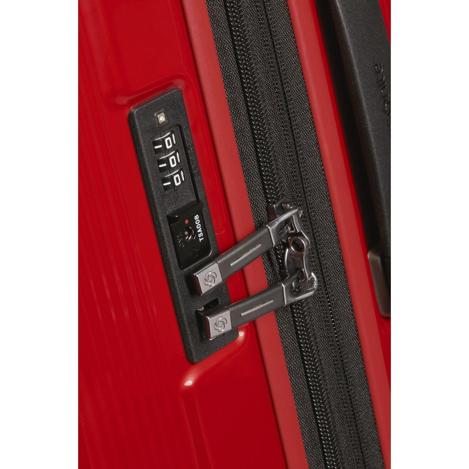 Lieblingstasche NUON Spinner 75/28 suitcase featuring a red hardshell exterior and integrated TSA combination lock.