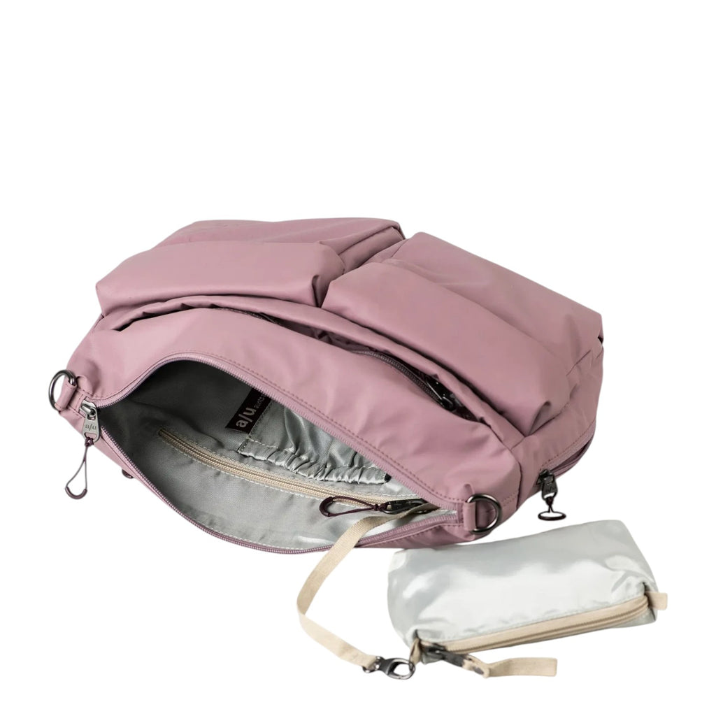 Lieblingstasche Omono RE lite mauve nylon shoulder bag with multiple exterior pockets and a detachable inner pouch