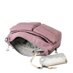 Lieblingstasche Omono RE lite mauve nylon shoulder bag with multiple exterior pockets and a detachable inner pouch