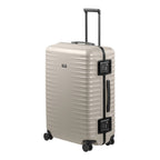 Lieblingstasche OVERSEAS 4w Trolley L in beige with a hard shell, four wheels, and integrated TSA combination locks.