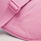 Lieblingstasche Cloud Moon Bag Small in pastel pink with adjustable strap and embossed logo detail