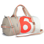 Lieblingstasche Pirat duffel bag made from recycled sailcloth with a white and beige design and orange number 6