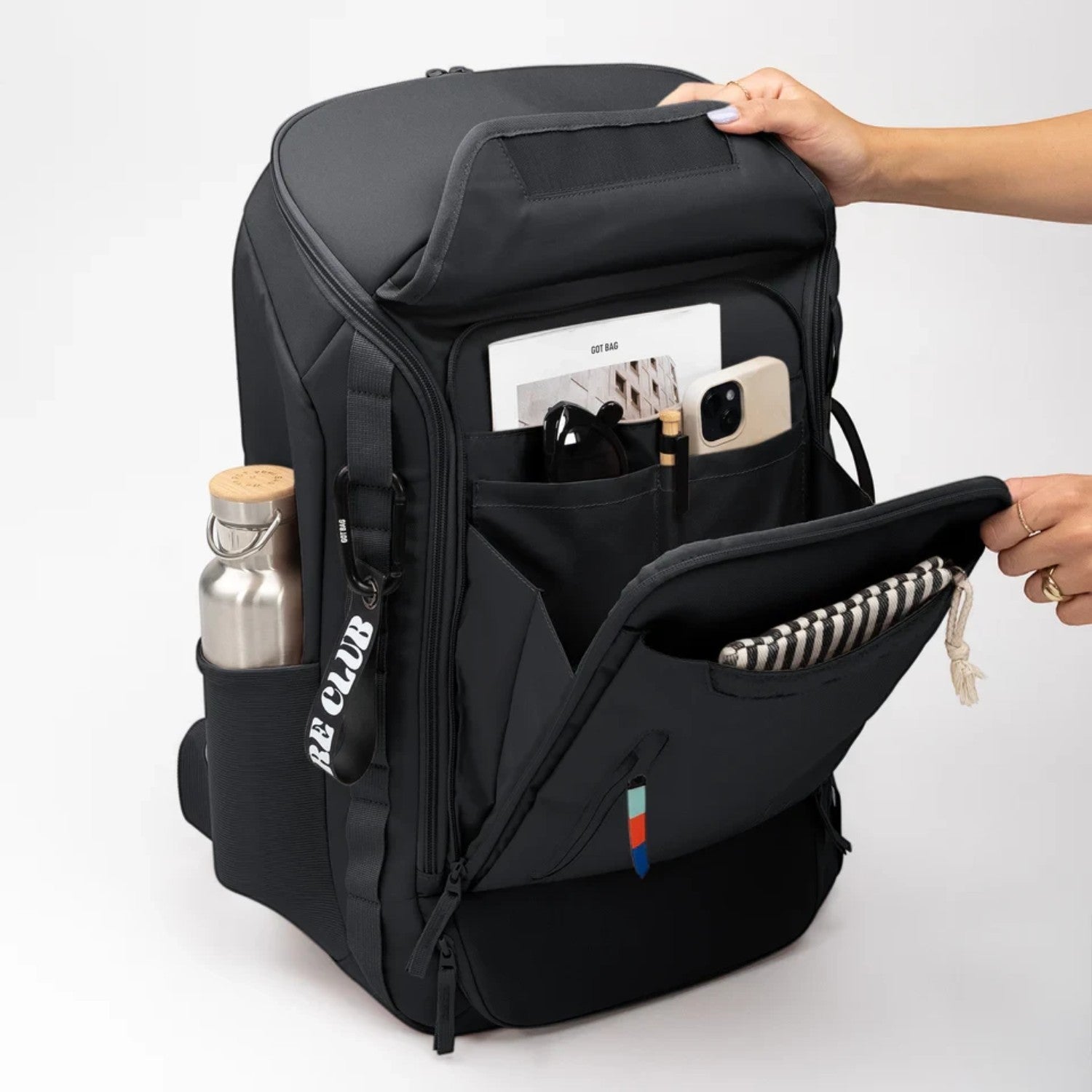 Lieblingstasche Pro Pack Travel black recycled backpack with open front organizer pocket and side water bottle holder