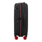 Lieblingstasche PRODIVER HS black spinner suitcase with red accents, TSA lock, and four wheels, side view.