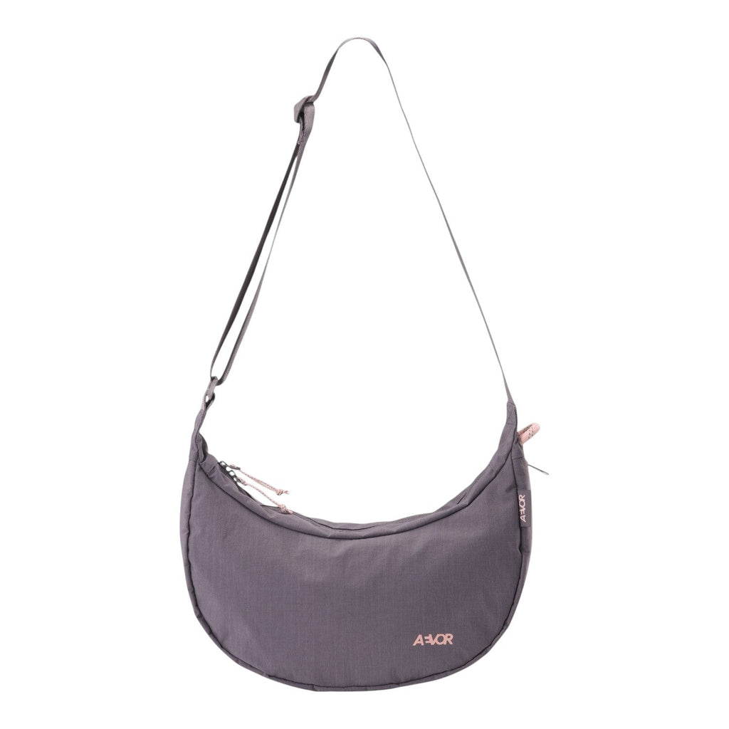 Lieblingstasche purple crescent-shaped sling bag with adjustable strap and zipper details