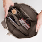 Lieblingstasche GOT BAG Rolltop 2.0 backpack interior showing laptop sleeve, water bottle, and organized compartments.
