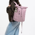 Lieblingstasche Rolltop Easy Small backpack in lilac purple with a water bottle pocket and zip detail.