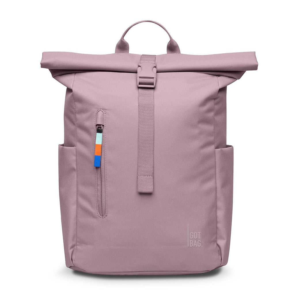 Lieblingstasche Rolltop Easy Small backpack in dusty rose pink with a roll-top closure and buckle. Features side pockets and a front zip pocket with a colorful pull tab.
