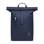Lieblingstasche Rolltop Lite 2.0 navy blue backpack with rolltop closure and front zip pocket with colorful pull.