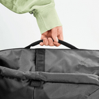 Lieblingstasche Rolly32 charcoal grey rolltop backpack made from recycled water-repellent material held by top handle