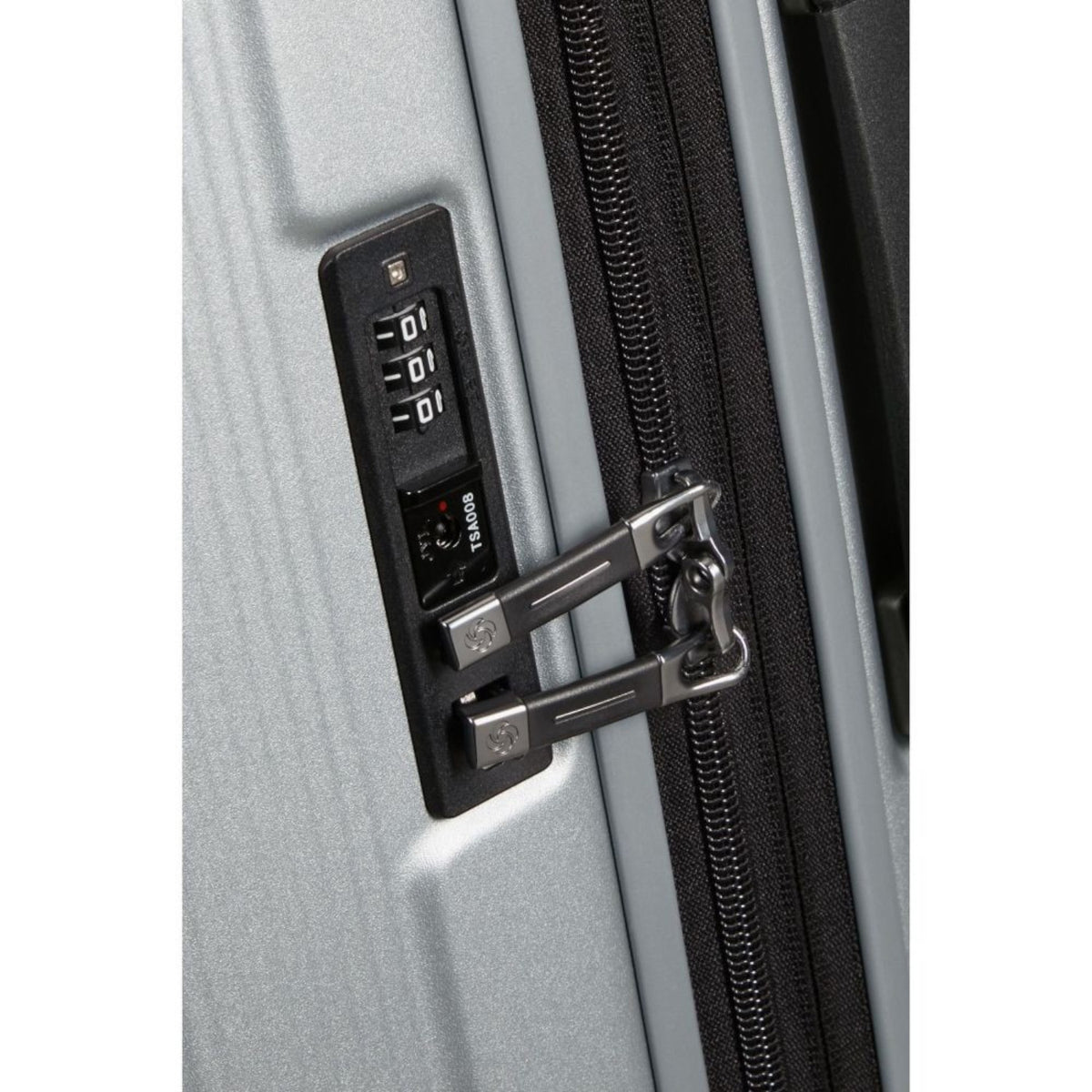 Lieblingstasche Samsonite Nuon spinner suitcase featuring a grey hardshell exterior and integrated TSA lock detail