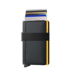 Lieblingstasche Secrid Bandwallet TPU in black with yellow accents, featuring an elastic strap and card protector.