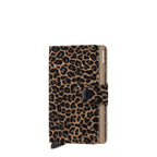 Lieblingstasche Secrid Miniwallet Leo with a brown and black leopard print leather cover and RFID protection