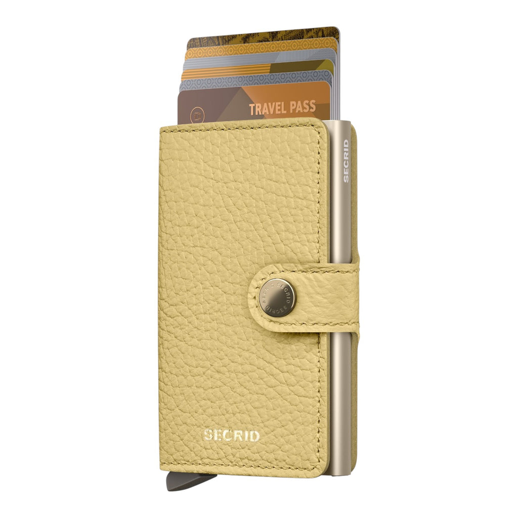 Lieblingstasche Secrid Miniwallet Pebble in yellow leather with an aluminum card protector and snap button closure.