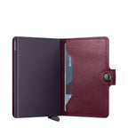 Lieblingstasche Secrid Miniwallet in dark purple leather with integrated RFID-protected card protector mechanism
