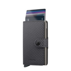 Lieblingstasche Secrid Miniwallet Pyramid in dark grey with a geometric textured pattern and card holder mechanism.