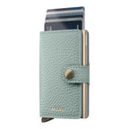 Lieblingstasche Secrid Miniwallet Pebble in sage green textured leather with gold metal card protector and snap button