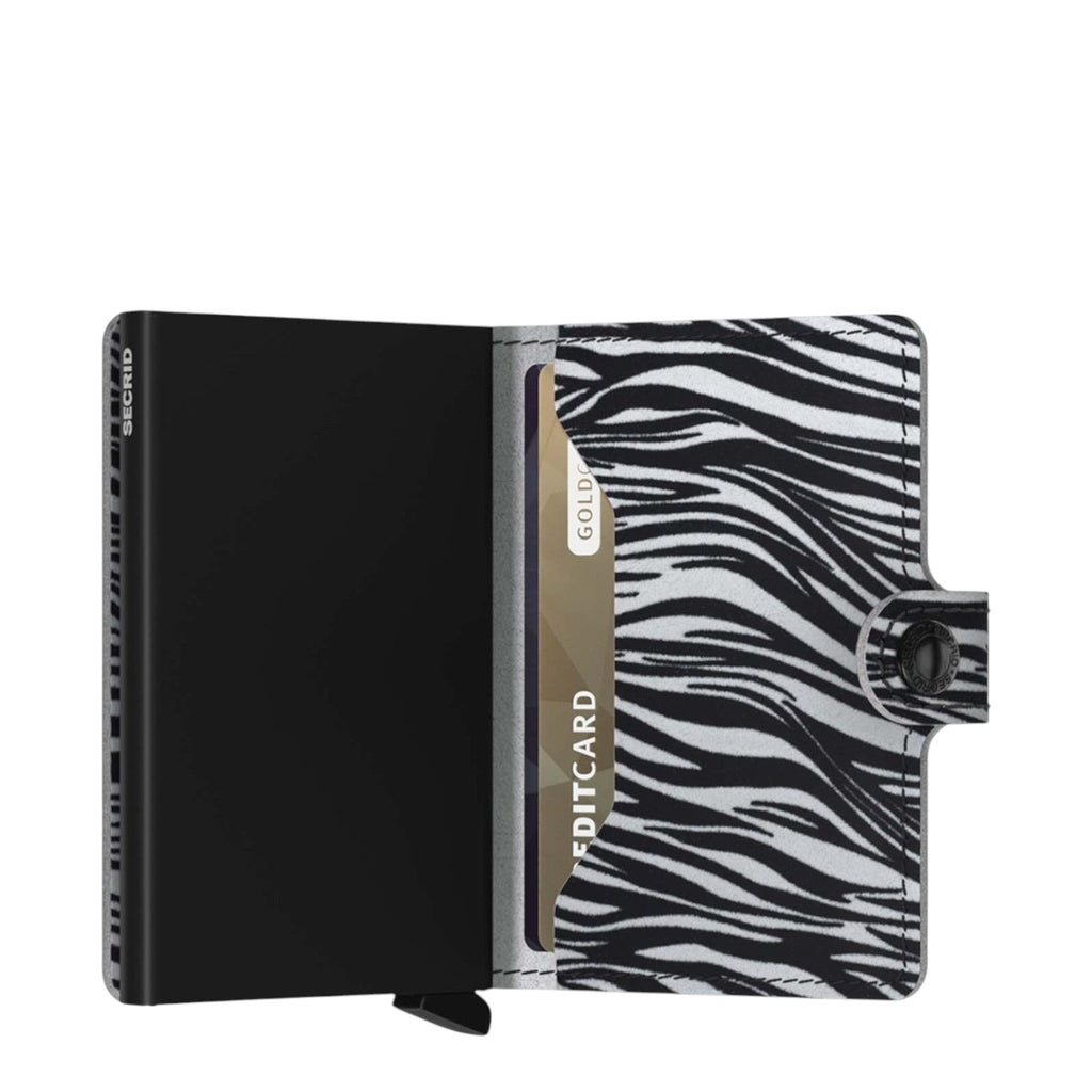 Lieblingstasche Secrid Miniwallet in black and white zebra print leather with an integrated RFID card protector