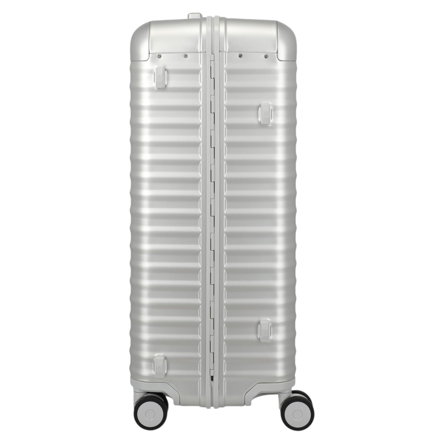 Lieblingstasche silver aluminium trolley suitcase with ribbed texture, leather handles, and four wheels.